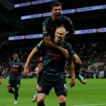 Delve into the strange emotional energy of Manchester City's pivotal win against Tottenham, as Erling Haaland's performance propels them closer to a fourth straight title.