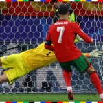 Portugal and Slovenia clash in a dramatic Euro 2024 Round of 16 match. Cristiano Ronaldo misses a crucial penalty as Jan Oblak's heroics keep Slovenia in the game, leading to a thrilling 0-0 draw after extra time.